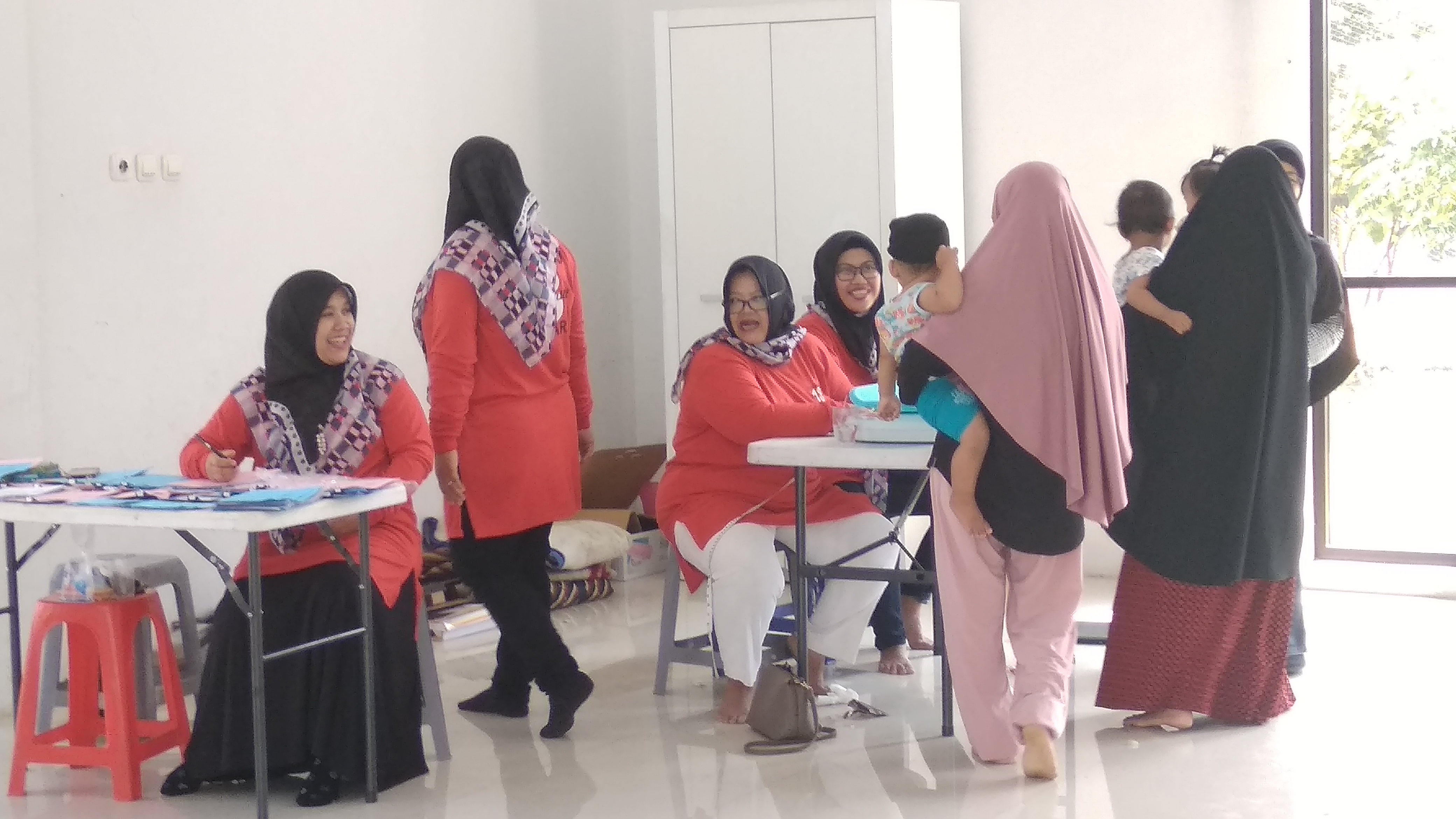 Pengabdian Masyarakat dengan tema Implementasi E-Locker pada Posyandu Mekar Arum 18 Kinagara Regency Kabupaten Bandung